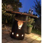 Es ist das Produktbild 2 für das folgende Produkt zu sehen: Feuertonne Stahlfass mit Stierkopf 176